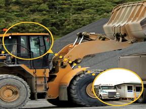 Wheel loader loading a truck and sending the load information to the scale house